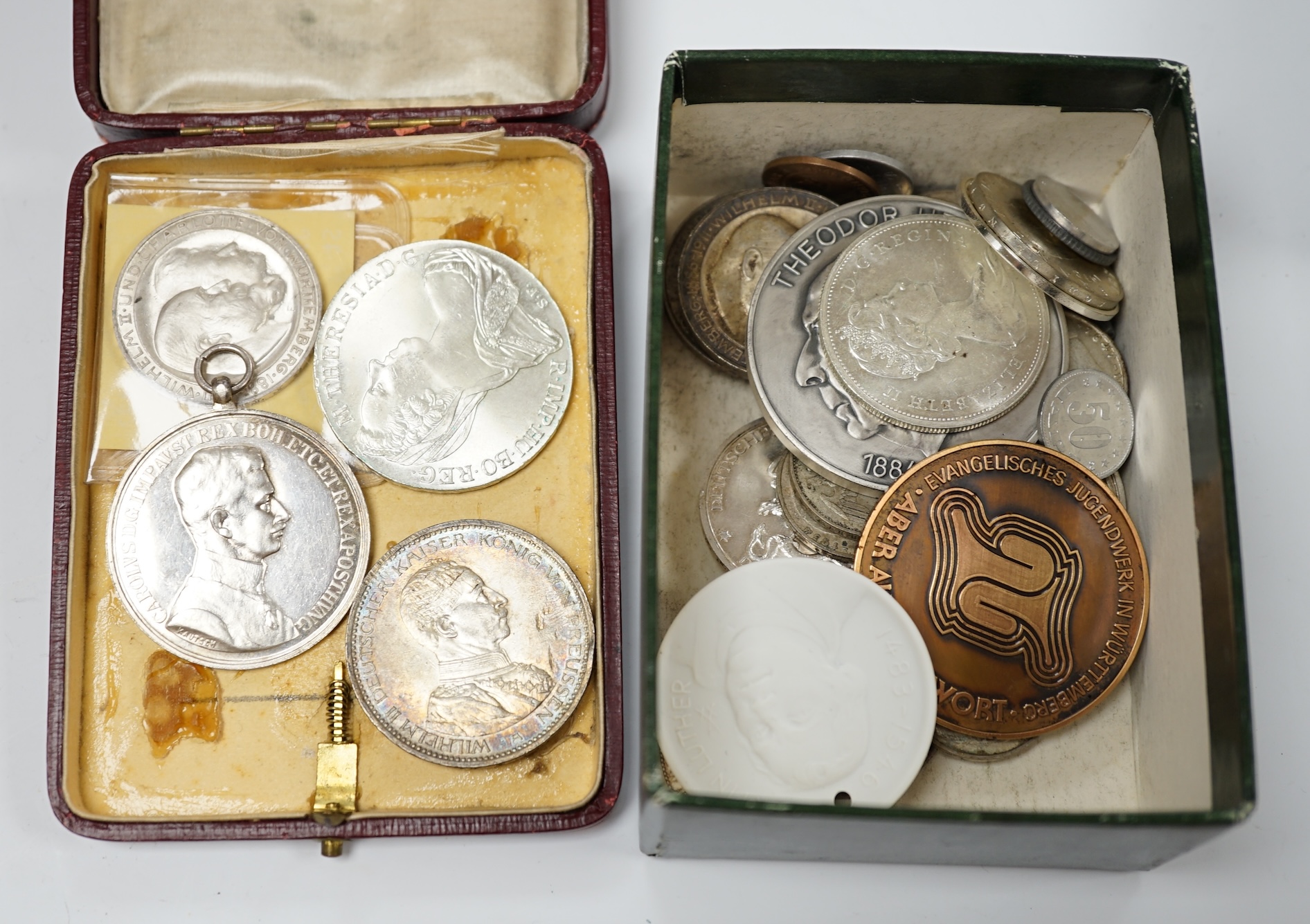 German and world coins, to include Württemberg Three Marks 1911, Prussia five marks 1914 etc., together with a Meissen biscuit porcelain Martin Luther commemorative medallion and two small boxes of coins. Condition - var